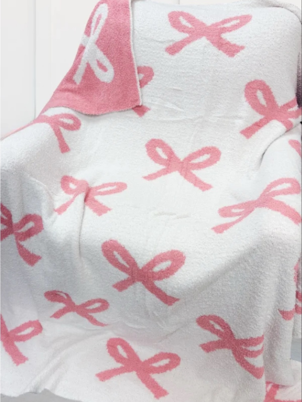 Pink and White Bow blanket. Reversible